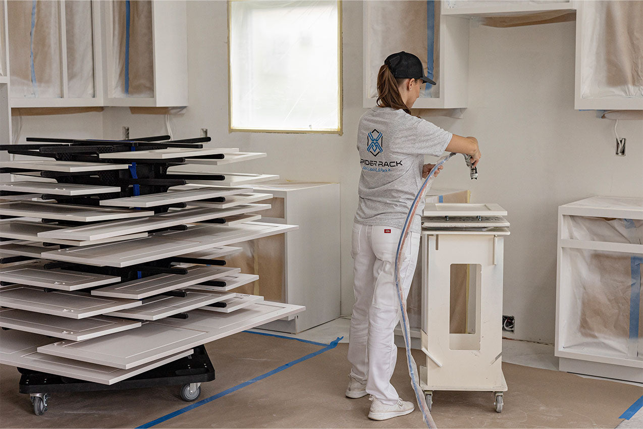 Person Using Portable Paint Drying Rack